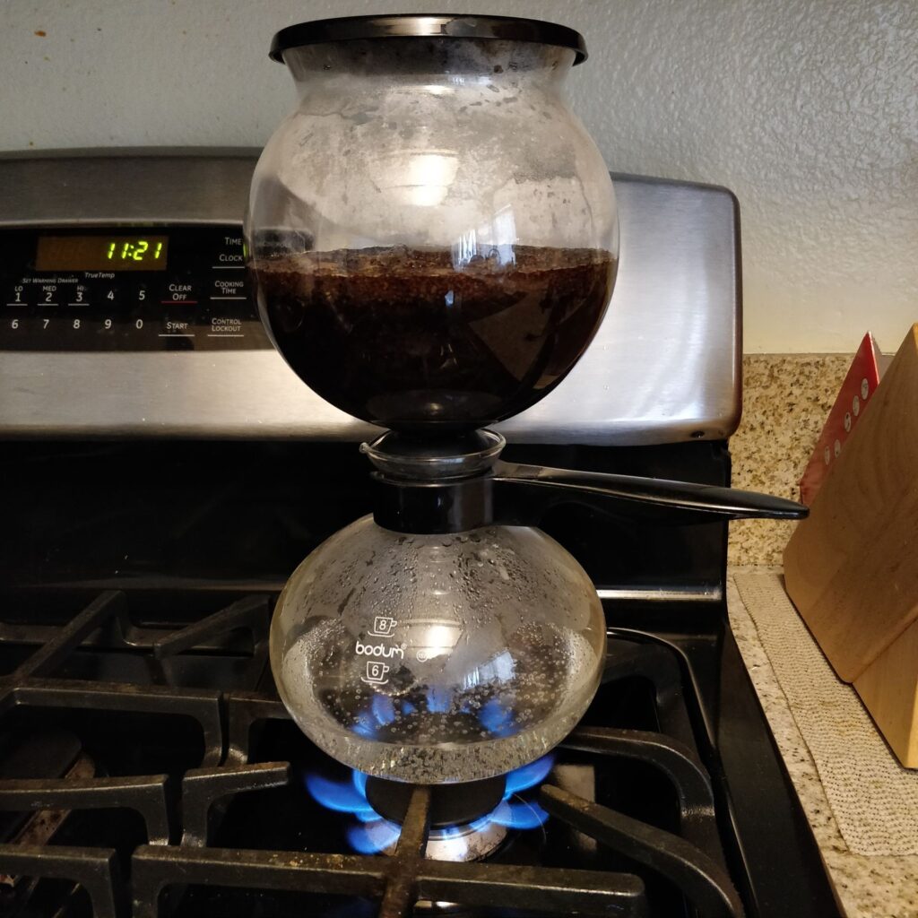 Bodum pebo stove top coffee maker at end of brew process