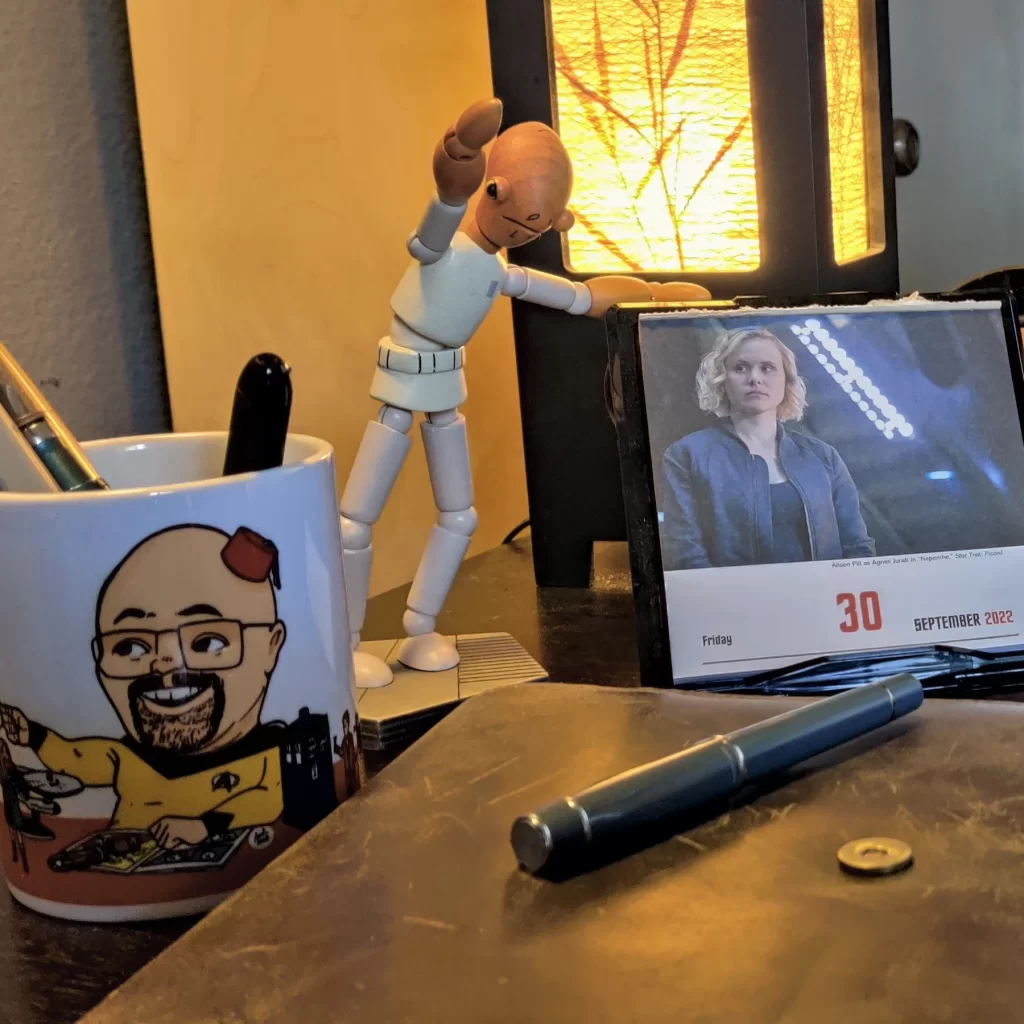 Pen cup and calendar on the side of my desk