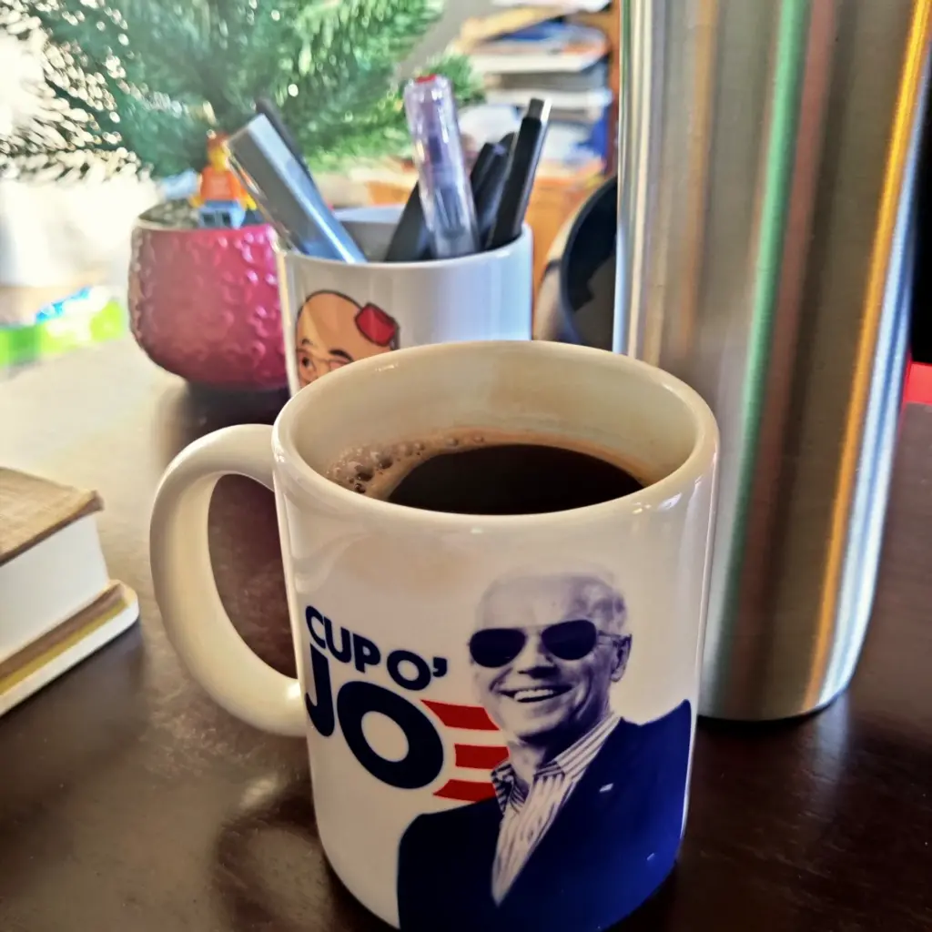 Joe Biden Coffee Mug from the 2020 presidential campaign full of coffee