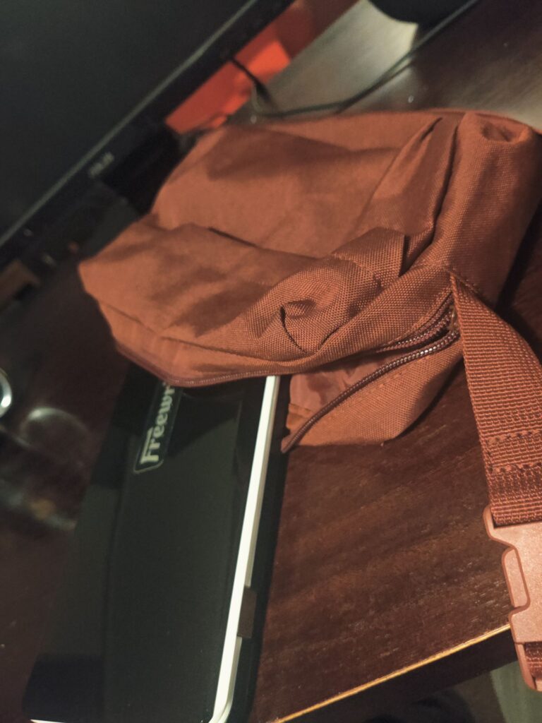 Freewrite Traveler and a Muji shoulder bag